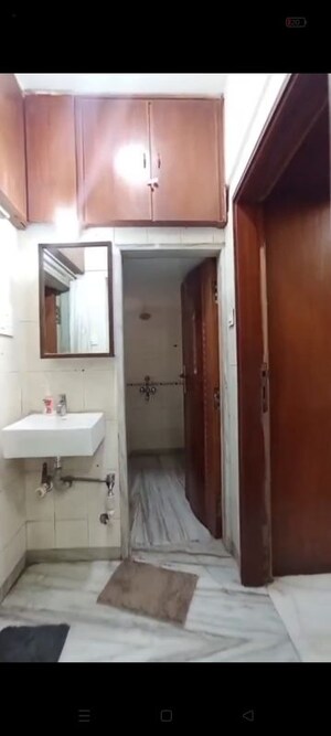 Bathroom in 1 BHK Apartment at Vireshwar Jyot CHS, Vile Parle East – for Rent