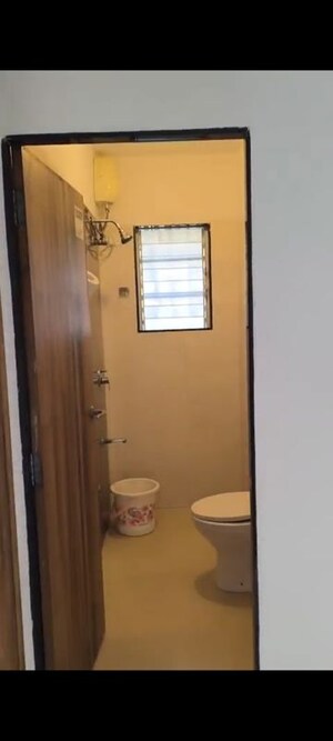 Bathroom in 2 BHK Apartment at Shri Sai Baba CHS, Vile Parle East – for Rent