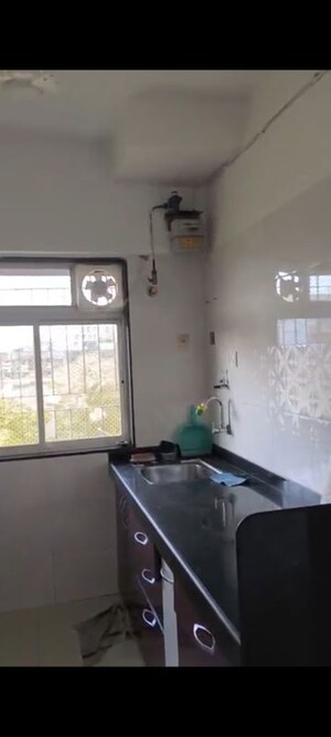 Kitchen in 2 BHK Apartment at Shri Sai Baba CHS, Vile Parle East – for Rent