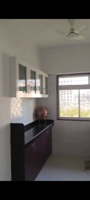 Kitchen in 2 BHK Apartment at Shri Sai Baba CHS, Vile Parle East – for Rent