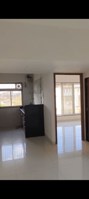 Living Room in 2 BHK Apartment at Shri Sai Baba CHS, Vile Parle East – for Rent