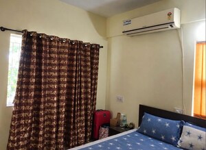 Bedroom in 2 BHK Apartment at Kumar Primavera, Wadgaon Sheri – for Rent
