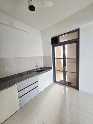 Kitchen in 2 BHK Apartment at Rohan Karan Evana, Wadgaon Sheri – for Rent