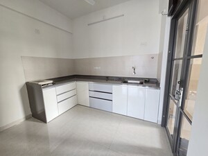 Kitchen in 2 BHK Apartment at Rohan Karan Evana, Wadgaon Sheri – for Rent