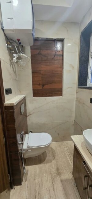 Bathroom in 2 BHK Builder Floor at Kalkaji – for Rent