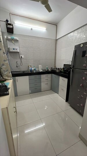 Kitchen in 2 BHK Apartment at Paranjape Schemes Madhukosh, Dhayari – for Rent