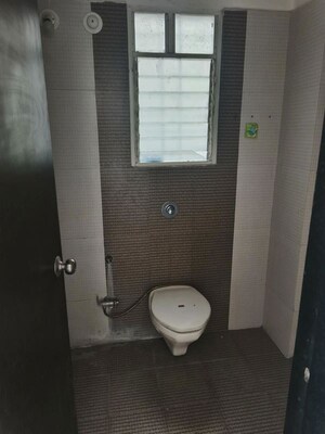 Bathroom in 2 BHK Apartment at Kolte Patil Margosa Heights, Mohammadwadi – for Sale