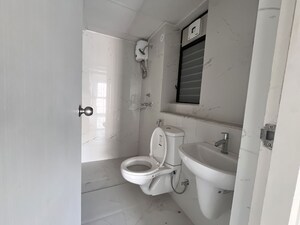 Bathroom in 2 BHK Apartment at Runwal Gardens, Dombivli East – for Rent