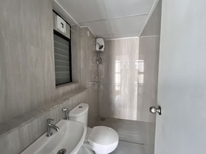 Bathroom in 2 BHK Apartment at Runwal Gardens, Dombivli East – for Rent