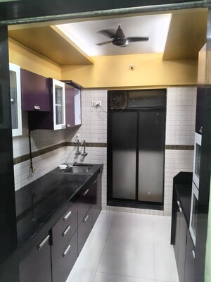 Kitchen in 2 BHK Apartment at Lucky  Nine Galaxy, Mira Road – for Rent