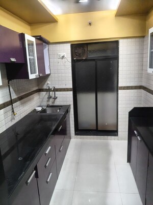 Kitchen in 2 BHK Apartment at Lucky  Nine Galaxy, Mira Road – for Rent