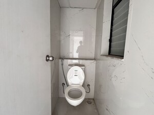 Bathroom in 1 BHK Apartment at Runwal Gardens, Dombivli East – for Sale