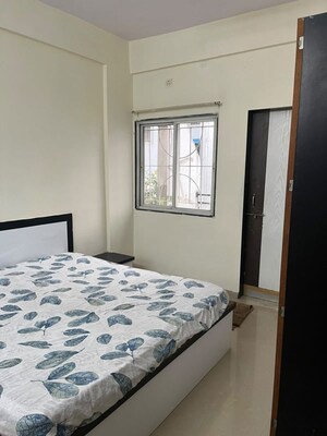 Bedroom in 2 BHK Apartment at SMK Platinum, Ravet – for Rent