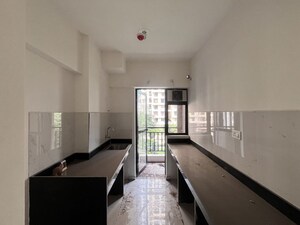 Kitchen in 1.5 BHK Apartment at Runwal Gardens, Dombivli East – for Sale