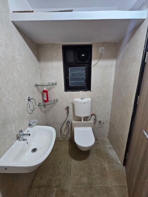 Bathroom in 2 BHK Apartment at Siddha Sky, Sion – for Rent