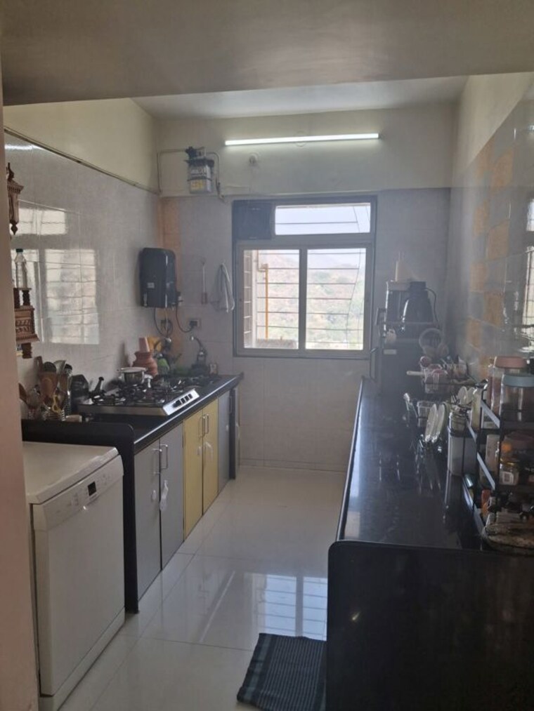 Kitchen, cosmos-lounge 2 Bedroom 740 Sq.Ft. Apartment In Manpada Thane 10786675