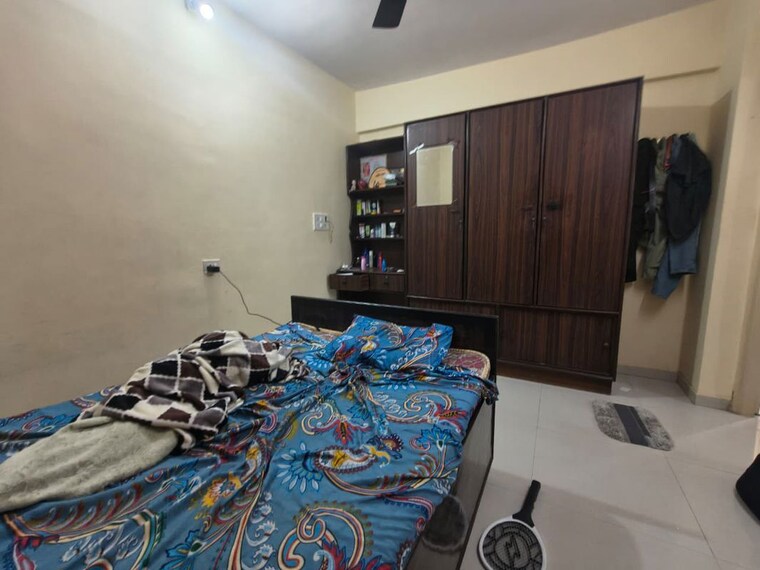 Bedroom, om-shri-ganesh-krupa-chs 1 Bedroom 575 Sq.Ft. Apartment In Kalwa Thane 10786733