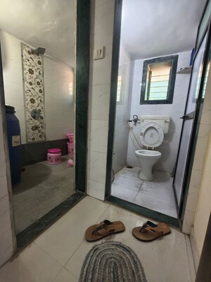 Bathroom in 1 BHK Apartment at Om Shri Ganesh Krupa CHS, Kalwa – for Rent