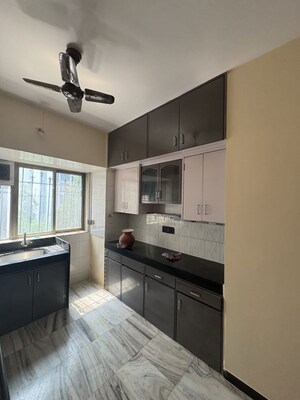Kitchen in 2 BHK Apartment at Hyde Park Galaxy, Manpada – for Rent