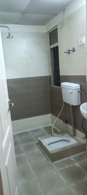Bathroom in 3 BHK Apartment at Aims Golf City, Sector 75 – for Rent