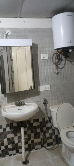 Bathroom in 3 BHK Apartment at Aims Golf City, Sector 75 – for Rent