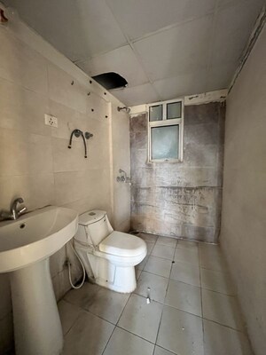 Bathroom in 2 BHK Apartment at Mittal Rajnagar Residency, Raj Nagar Extension – for Sale