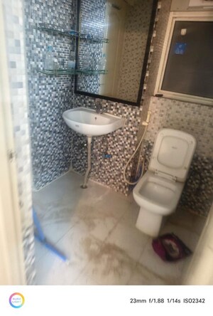 Bathroom in 3 BHK Apartment at Aims Golf City, Sector 75 – for Rent