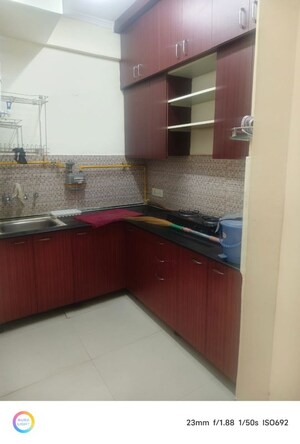 Kitchen in 3 BHK Apartment at Aims Golf City, Sector 75 – for Rent