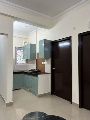 Kitchen in 3 BHK Apartment at Aims Golf City, Sector 75 – for Rent
