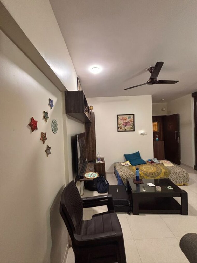 Living Room, gera-misty-water 2 Bedroom 804 Sq.Ft. Apartment In Mundhwa Pune 10786957