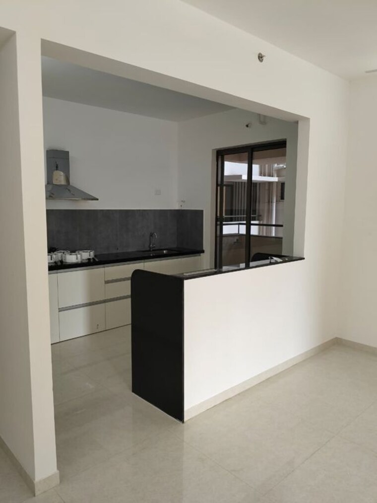 Kitchen, pride-world-city-wellington 3 Bedroom 1056 Sq.Ft. Apartment In Charholi Budruk Pune 10786494