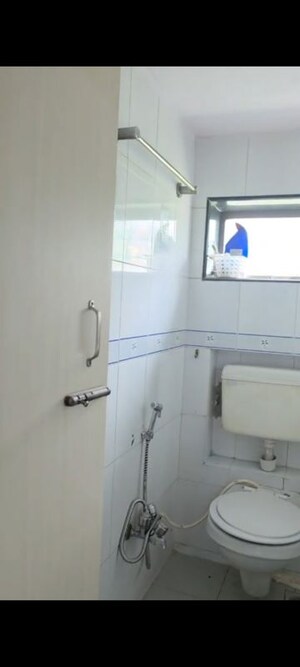 Bathroom in 1 BHK Apartment at Andheri CHS, Andheri West – for Rent