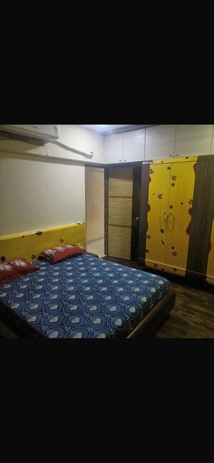 Bedroom in 3 BHK Apartment at Heena Gaurav Heights, Kandivali West – for Rent