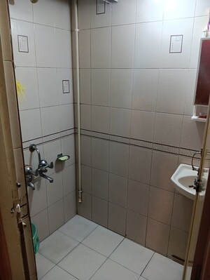Bathroom in 1 BHK Apartment at Zainab Tower, Madanpura – for Sale