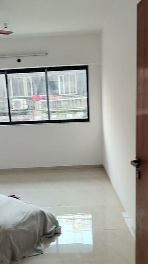 Room in 1 BHK Apartment at Yashaswi Phoenix B, Girgaon – for Sale