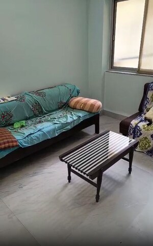 Bedroom in 2 BHK Apartment at Mahesh Villa CHS, Andheri West – for Sale