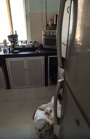 Kitchen in 2 BHK Apartment at Mahesh Villa CHS, Andheri West – for Sale