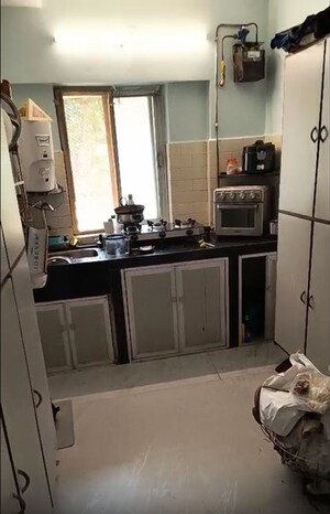 Kitchen in 2 BHK Apartment at Mahesh Villa CHS, Andheri West – for Sale