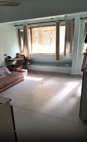 Living Room in 2 BHK Apartment at Mahesh Villa CHS, Andheri West – for Sale