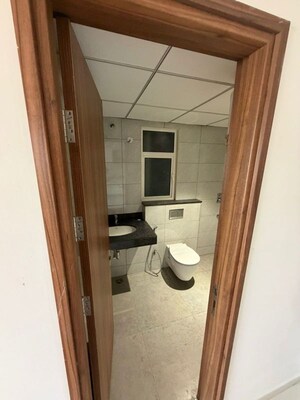 Bathroom in Studio Apartment at Godrej Golf Links Crest, Sector 27 Yamuna Expressway – for Sale