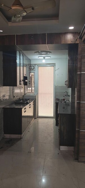 Kitchen in 2.5 BHK Apartment at Sikka Karmic Greens, Sector 78 – for Rent