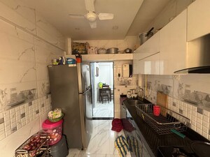 Kitchen in 2 BHK Apartment at Kulswamini Residency, Kharghar – for Sale