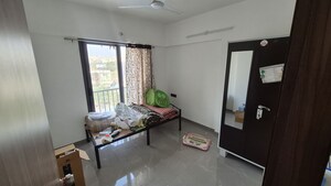 Living Room in 2 BHK Apartment at Choice Goodwill Fabian, Lohgaon – for Rent
