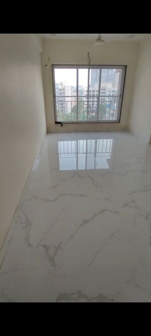 Room in 2 BHK Apartment at Royal Eksar Apartment, Borivali West – for Sale