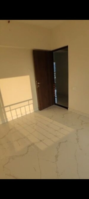 Room in 2 BHK Apartment at Royal Eksar Apartment, Borivali West – for Sale
