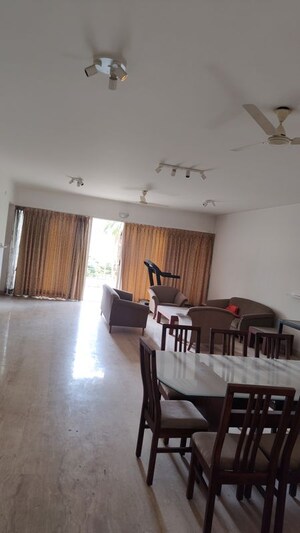 Living Room in 4 BHK Apartment at Panchshil One North, Magarpatta City – for Sale