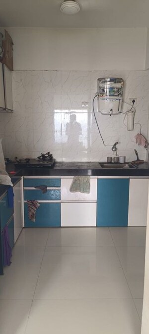 Kitchen in 2 BHK Apartment at Pristine Equilife Homes Phase III, Mahalunge Ingale – for Rent