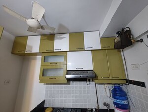 Kitchen in 1 BHK Apartment at Raunak Unnathi Woods Phase 7 A And B, Ghodbunder Road – for Rent