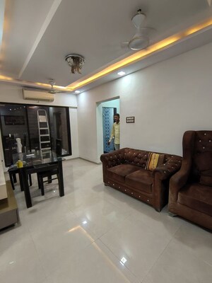 Living Room in 2 BHK Apartment at Prathampad Apartments, Malad West – for Rent