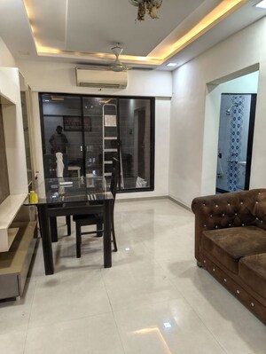 Living Room in 2 BHK Apartment at Prathampad Apartments, Malad West – for Rent